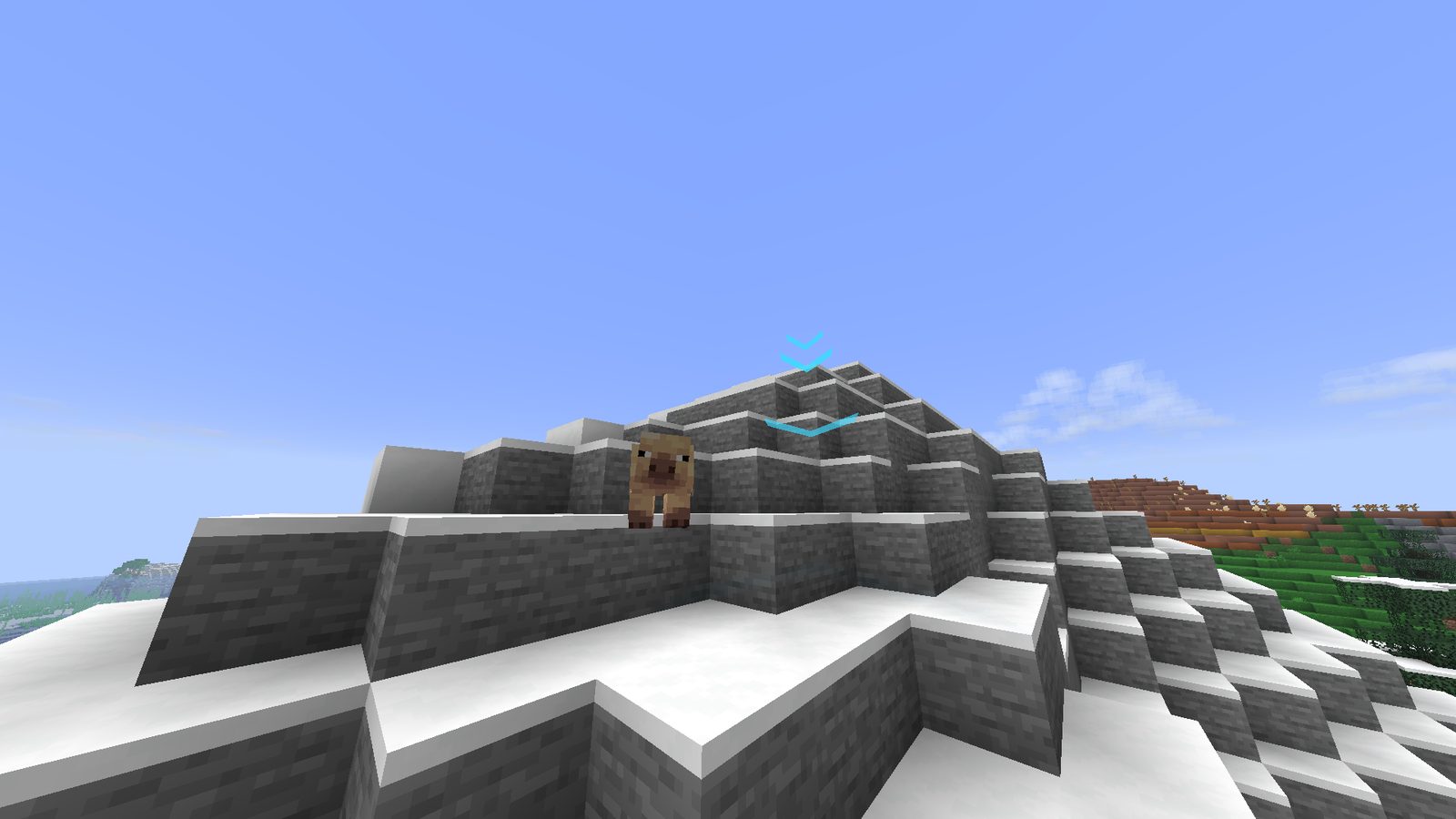 A trail of arrows leading up a snowy mountainside in Minecraft